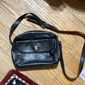Used Paloma Picasso black purse.